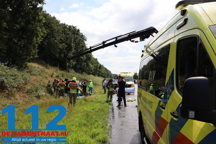 Persoon raakt bekneld onder auto in Tilburg, traumahelikopter landt op de weg 11 Persoon raakt bekneld onder auto in Tilburg, traumahelikopter landt op de weg 112 De Langstraat