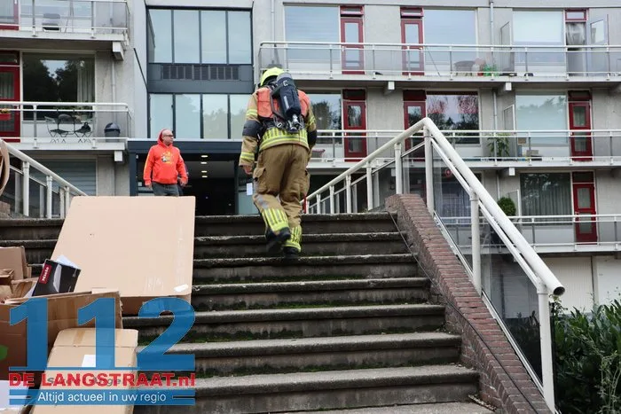 Bewoners moeten Waalwijks complex verlaten door brand 19 Bewoners moeten Waalwijks complex verlaten door brand 112 De Langstraat