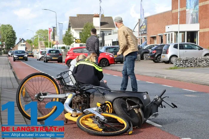 Scooterrijdster gewond bij botsing met fietsster in Sprang-Capelle 1 Scooterrijdster gewond bij botsing met fietsster in Sprang-Capelle 112 De Langstraat