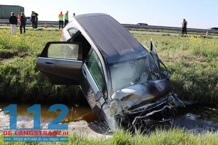 Auto vliegt in brand na botsing met vrachtwagen Waspik 4 Auto vliegt in brand na botsing met vrachtwagen Waspik 112 De Langstraat