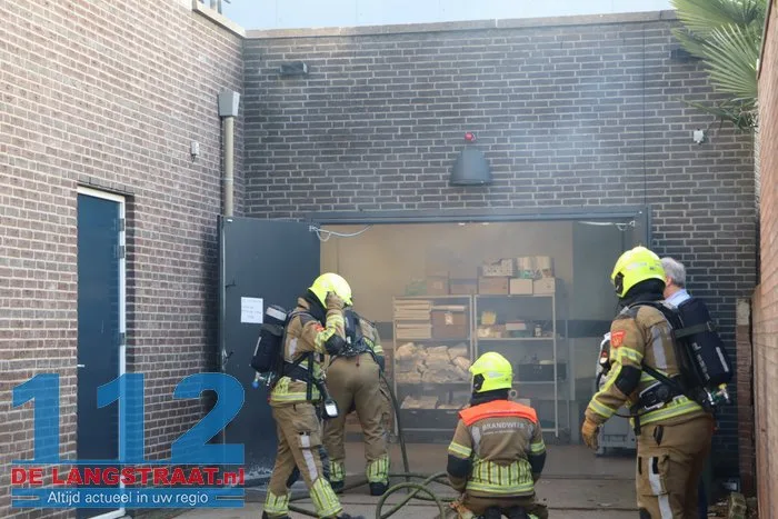 Brand in perscontainer bij Aldi Kaatsheuvel, woningen ontruimd 112 De Langstraat