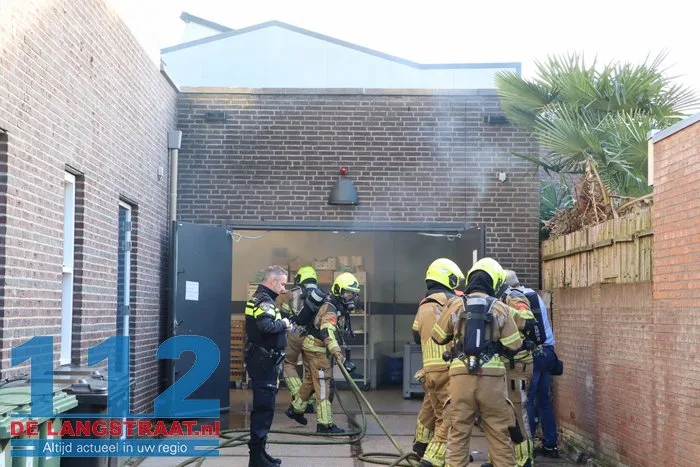 Brand in perscontainer bij Aldi Kaatsheuvel, woningen ontruimd 112 De Langstraat