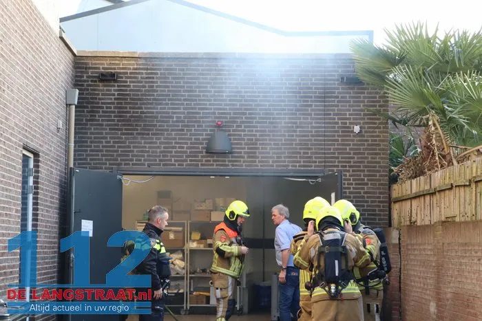 Brand in perscontainer bij Aldi Kaatsheuvel, woningen ontruimd 112 De Langstraat