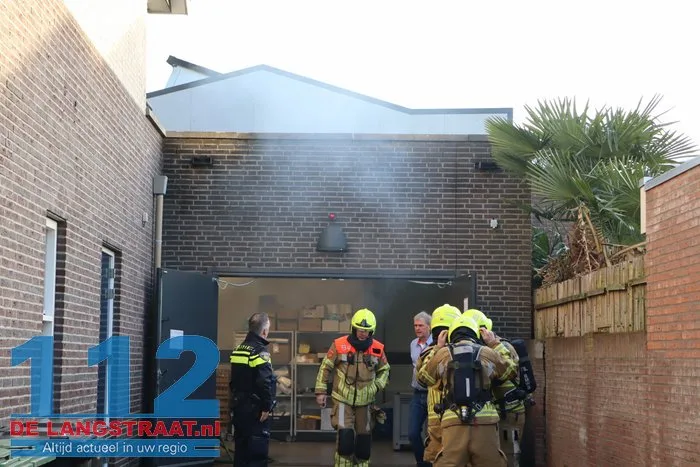 Brand in perscontainer bij Aldi Kaatsheuvel, woningen ontruimd 112 De Langstraat