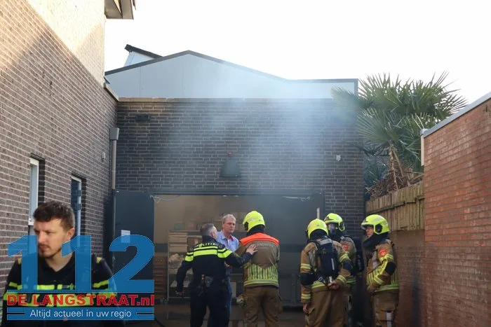 Brand in perscontainer bij Aldi Kaatsheuvel, woningen ontruimd 112 De Langstraat