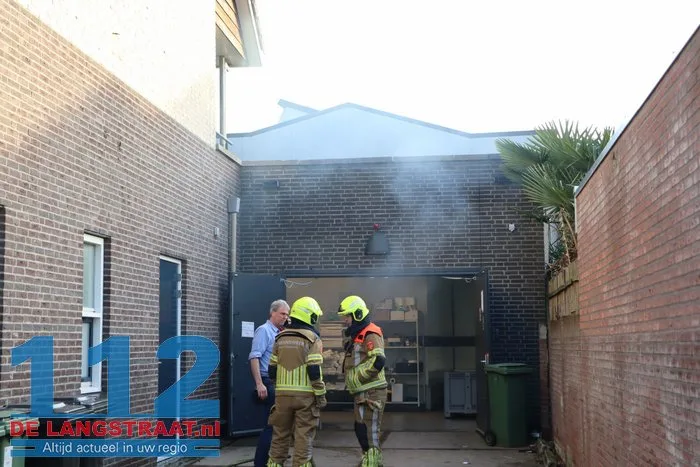 Brand in perscontainer bij Aldi Kaatsheuvel, woningen ontruimd 112 De Langstraat