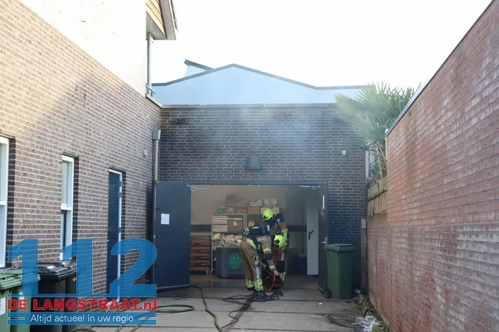 Brand in perscontainer bij Aldi Kaatsheuvel, woningen ontruimd 112 De Langstraat