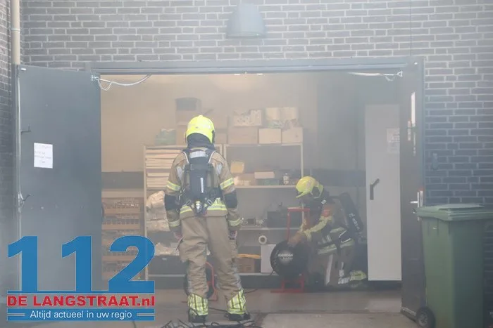 Brand in perscontainer bij Aldi Kaatsheuvel, woningen ontruimd 112 De Langstraat
