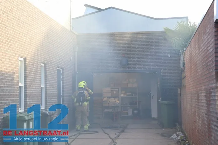 Brand in perscontainer bij Aldi Kaatsheuvel, woningen ontruimd 112 De Langstraat