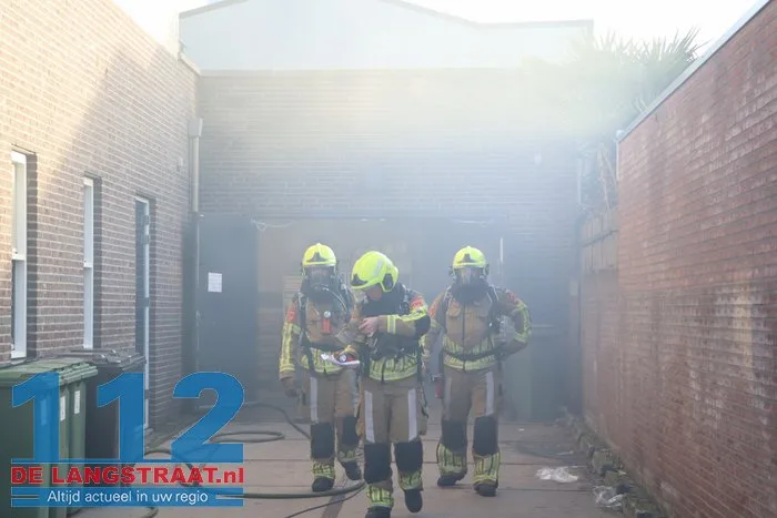 Brand in perscontainer bij Aldi Kaatsheuvel, woningen ontruimd 112 De Langstraat