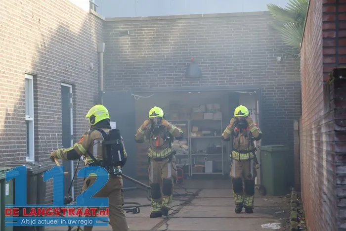 Brand in perscontainer bij Aldi Kaatsheuvel, woningen ontruimd 112 De Langstraat