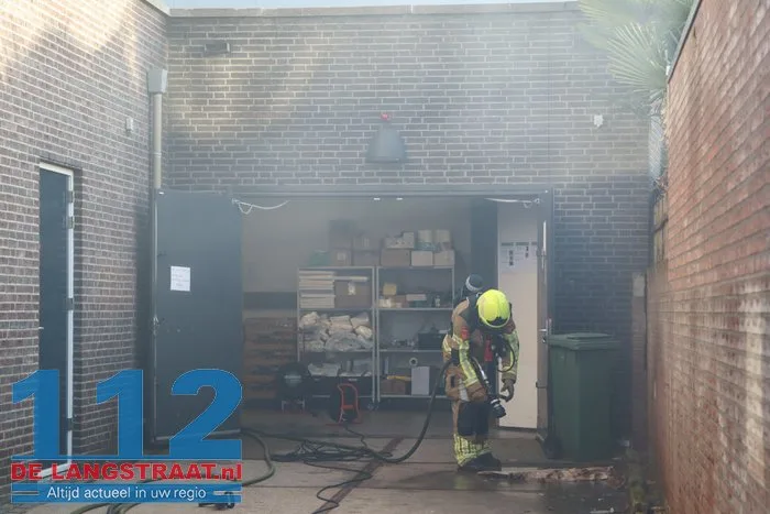 Brand in perscontainer bij Aldi Kaatsheuvel, woningen ontruimd 112 De Langstraat