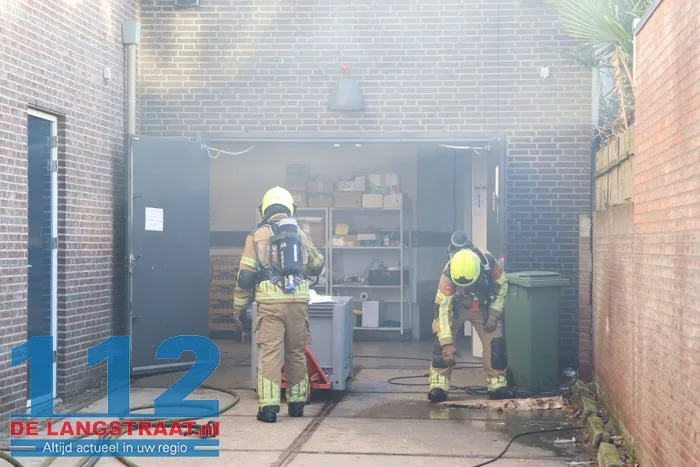 Brand in perscontainer bij Aldi Kaatsheuvel, woningen ontruimd 112 De Langstraat