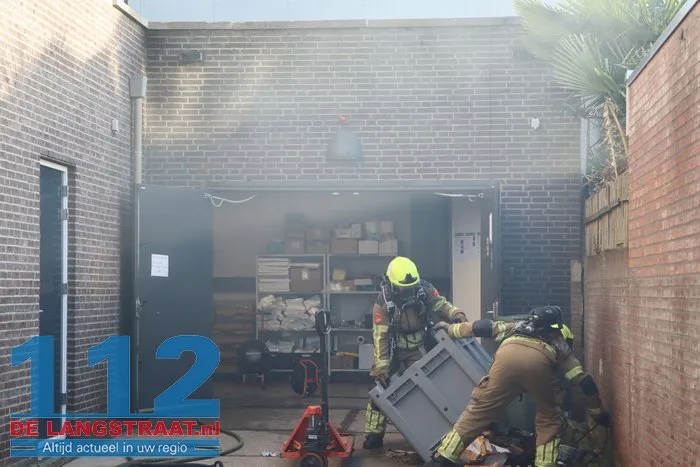 Brand in perscontainer bij Aldi Kaatsheuvel, woningen ontruimd 112 De Langstraat