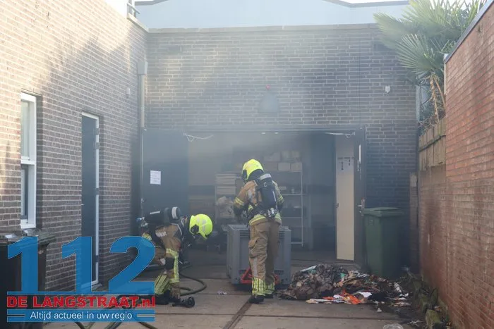 Brand in perscontainer bij Aldi Kaatsheuvel, woningen ontruimd 112 De Langstraat