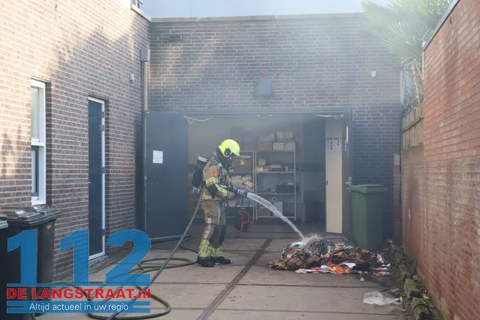 Brand in perscontainer bij Aldi Kaatsheuvel, woningen ontruimd 112 De Langstraat