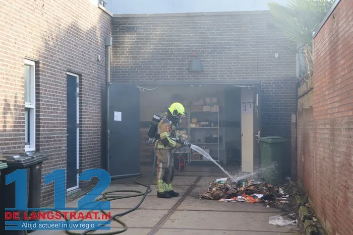 Brand in perscontainer bij Aldi Kaatsheuvel, woningen ontruimd 112 De Langstraat