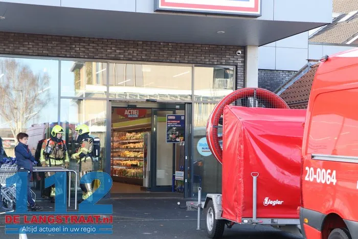 Brand in perscontainer bij Aldi Kaatsheuvel, woningen ontruimd 112 De Langstraat
