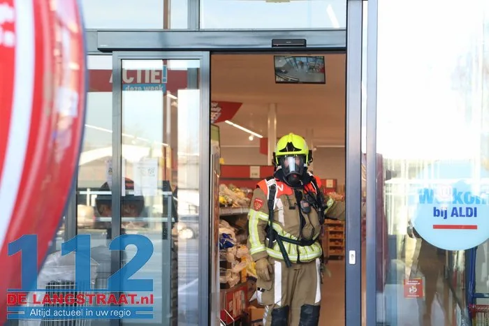 Brand in perscontainer bij Aldi Kaatsheuvel, woningen ontruimd 112 De Langstraat