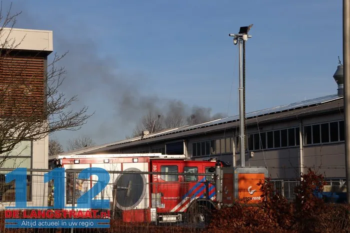 Brand uitgebroken op terrein van Ecco in Dongen, brandweer stond kwartier voor gesloten poort 112 De Langstraat