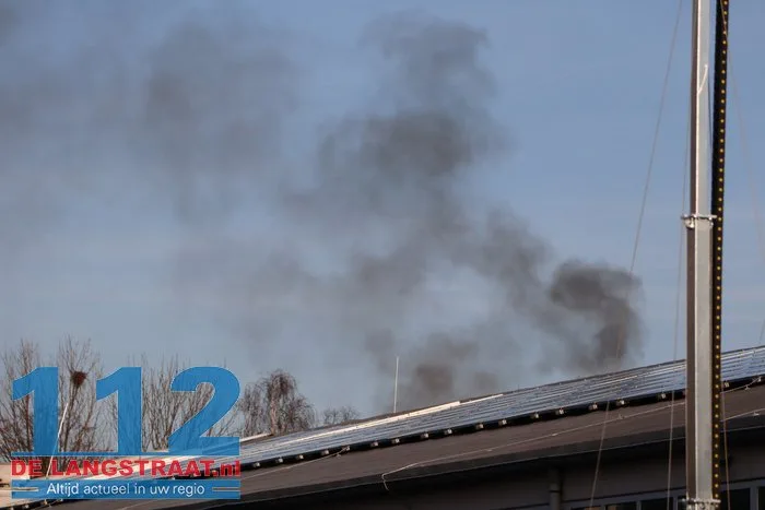 Brand uitgebroken op terrein van Ecco in Dongen, brandweer stond kwartier voor gesloten poort 112 De Langstraat