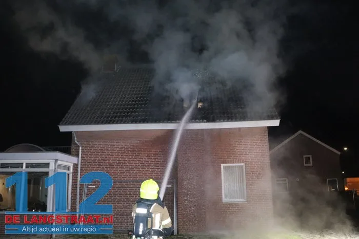 Uitslaande brand in woning Heistraat Sprang-Capelle 112 De Langstraat
