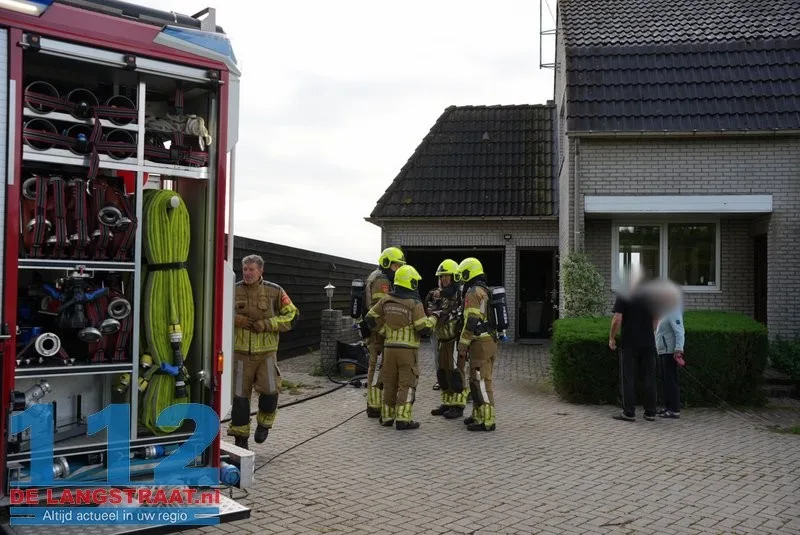 Brand in garage van woning aan Scharloo in Waspik, bewoonster naar ziekenhuis 112 De Langstraat