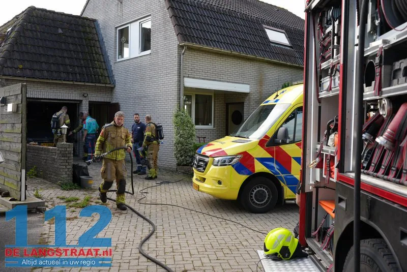 Brand in garage van woning aan Scharloo in Waspik, bewoonster naar ziekenhuis 112 De Langstraat