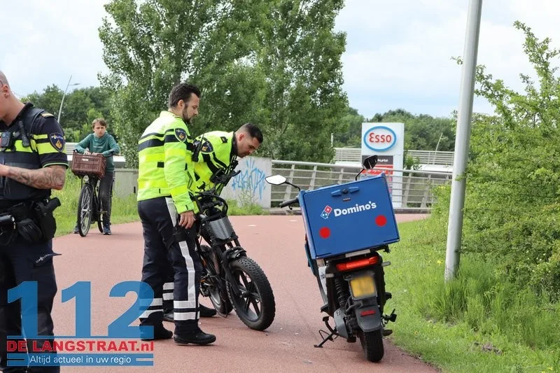Ernstig ongeval bij fietsbrug Prof. Asserweg: Frontale botsing tussen fatbike en scooter 7 Ernstig ongeval bij fietsbrug Prof. Asserweg: Frontale botsing tussen fatbike en scooter 112 De Langstraat